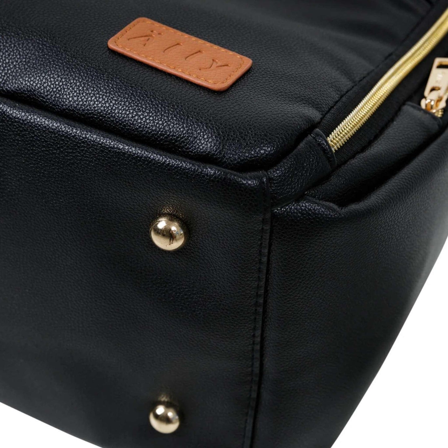 Close-up of a black leather bag with gold accents and a visible brand logo.