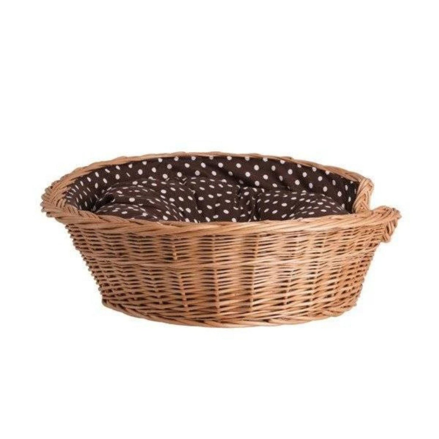 Wicker pet bed with a black and white polka dot interior on a white background