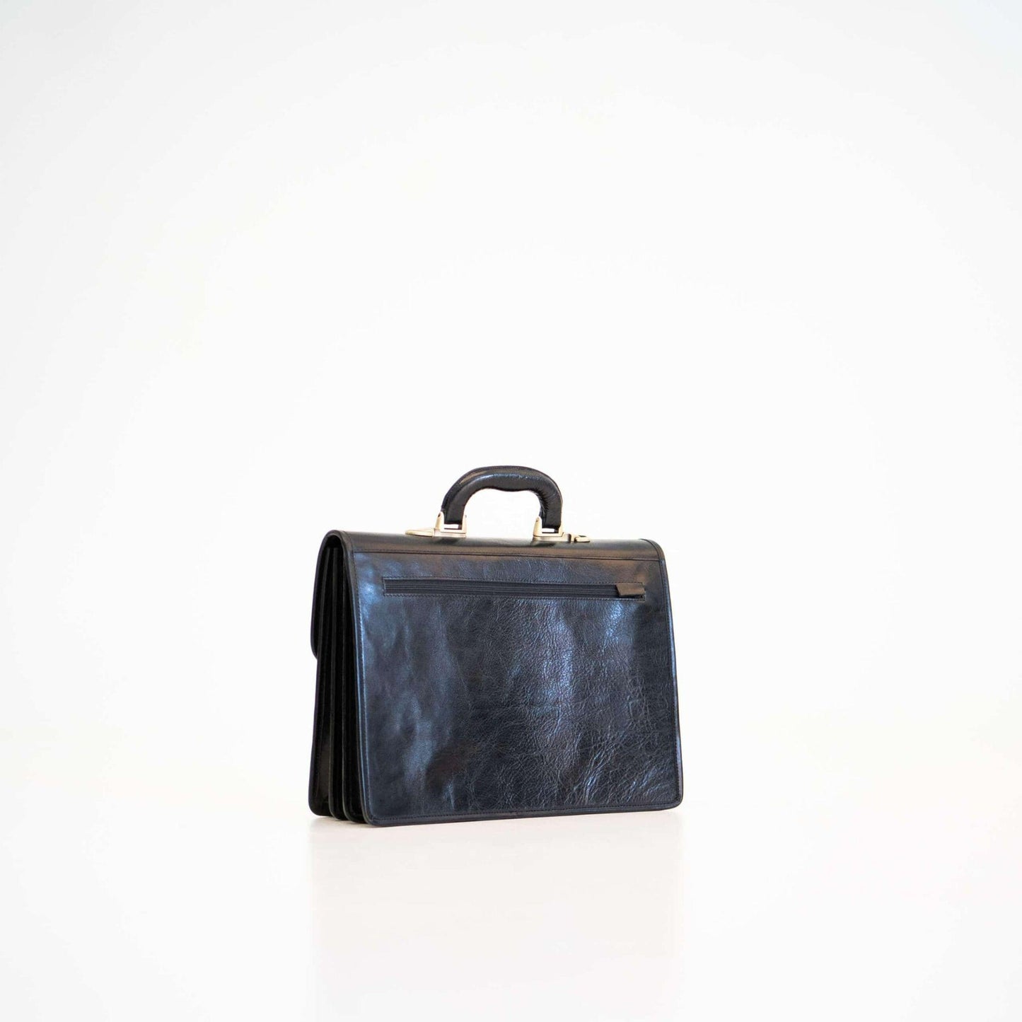 Black leather briefcase on a white background