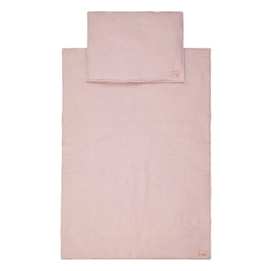 Pink bed sheet set with pillowcase on a white background