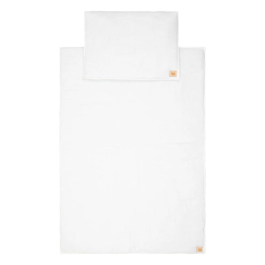 White pillowcase with a brand logo on a white background