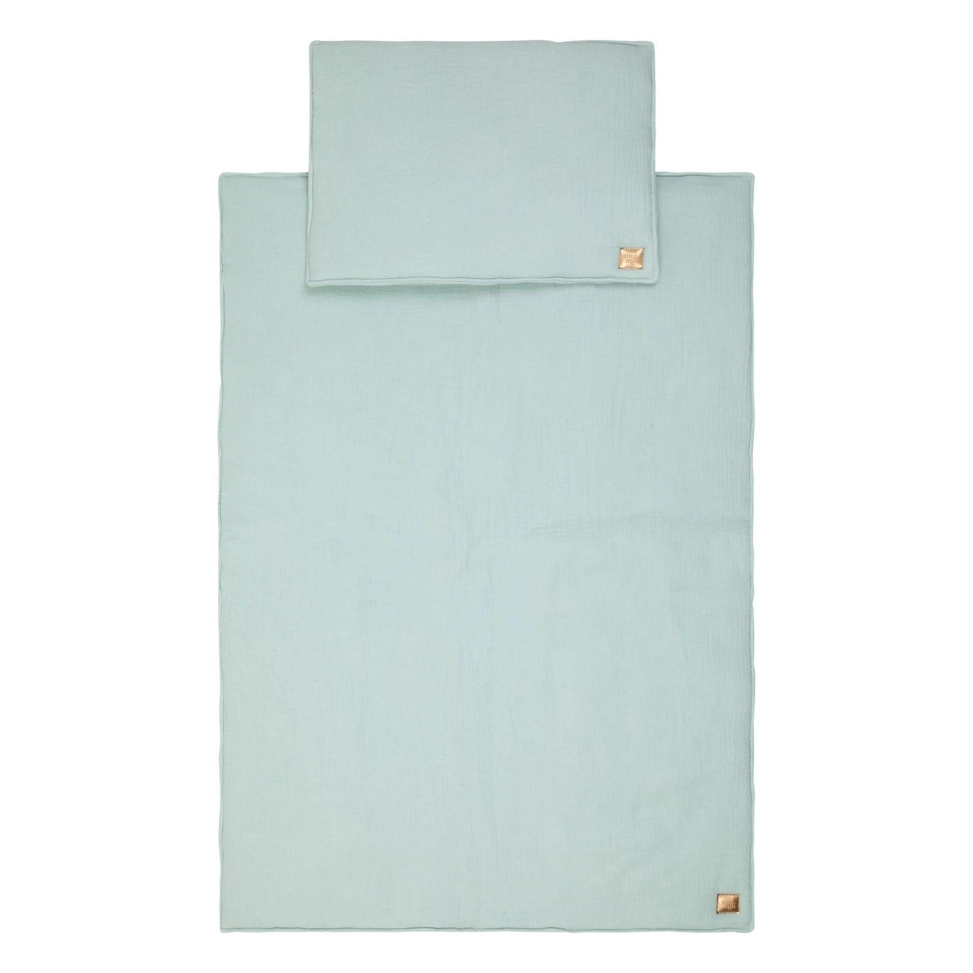 Light blue bed sheet set with matching pillowcase on a white background
