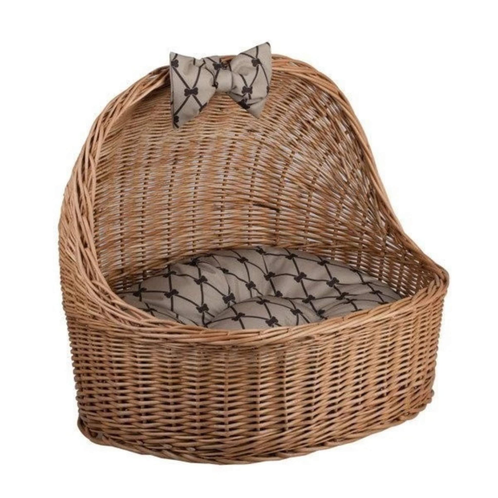 Wicker pet bed with a patterned cushion on a white background