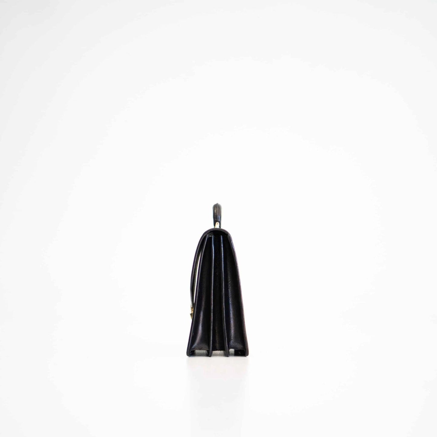 Black pendant light fixture on a white background